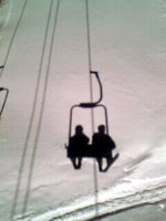  ���t�g�ɏ���l�c�c�̉e